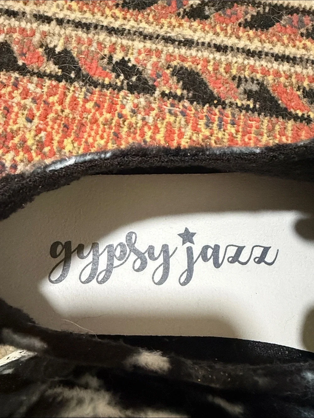 Gypsy Jazz Black & White Cow Print Slip-On Sneakers